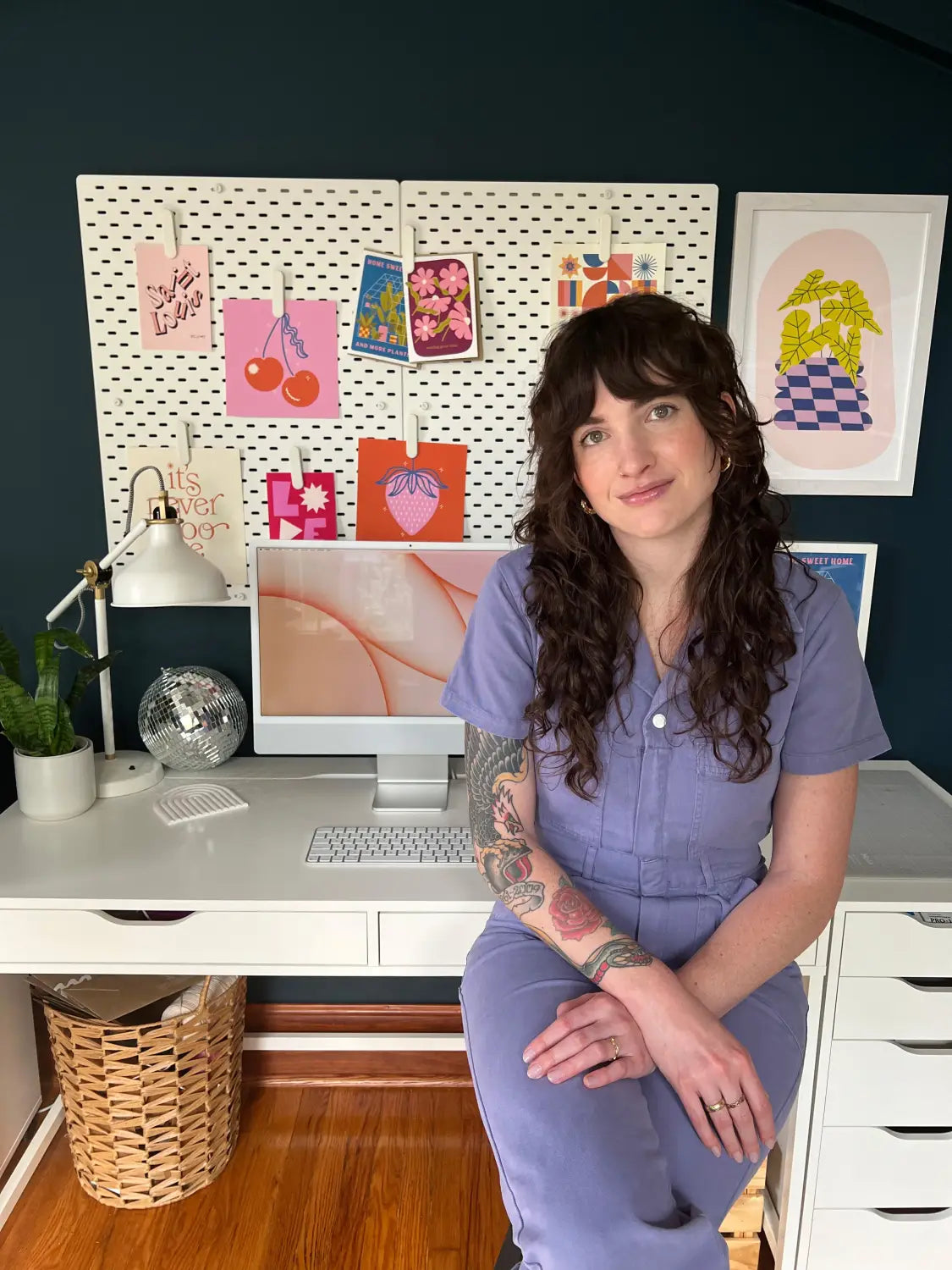 Cozy home office setup showcasing colorful artwork and Fond Printed Goods vibe.