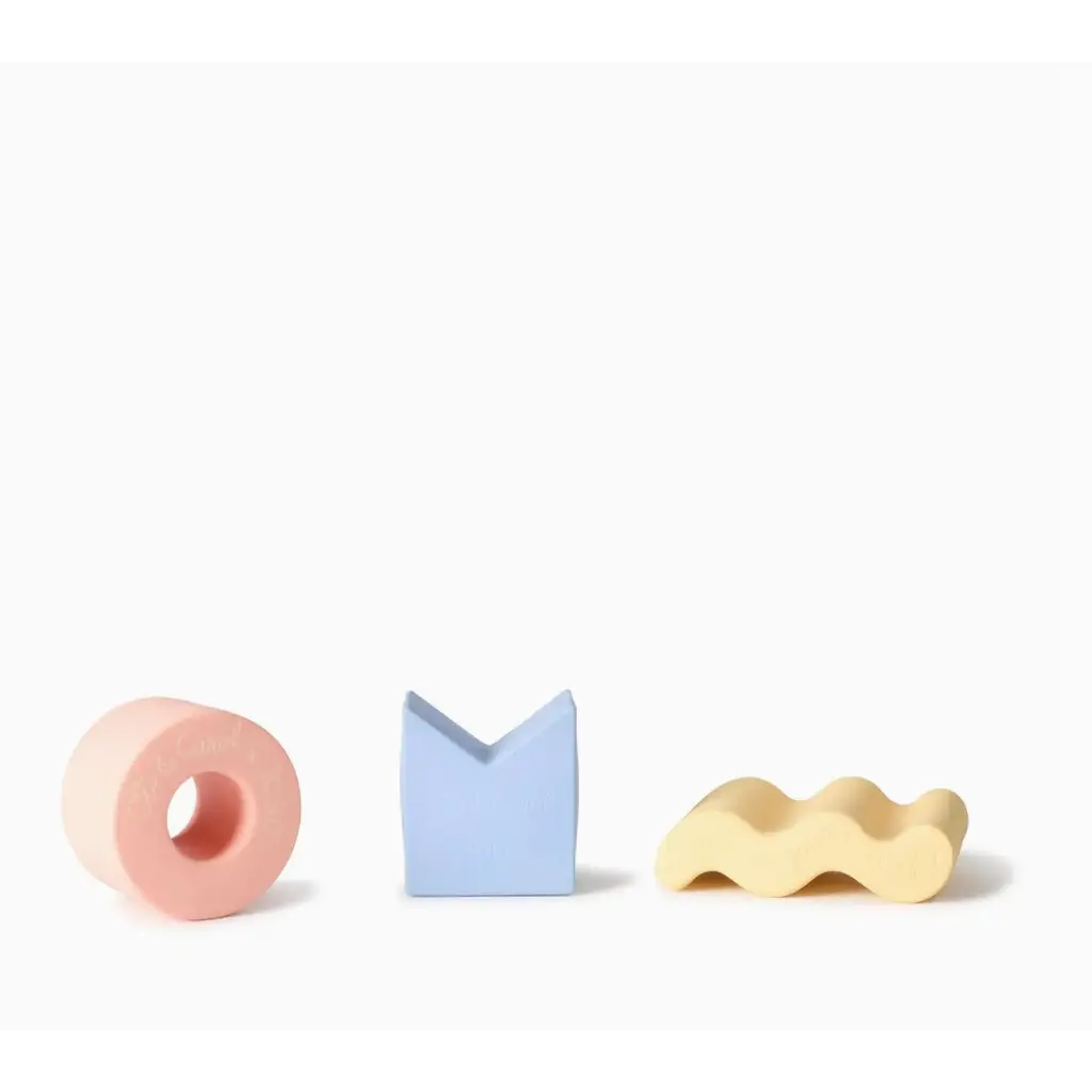 Three pastel geometric figures in natural rubber, perfect for floating stacking blocks