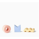 Three pastel geometric figures in natural rubber, perfect for floating stacking blocks
