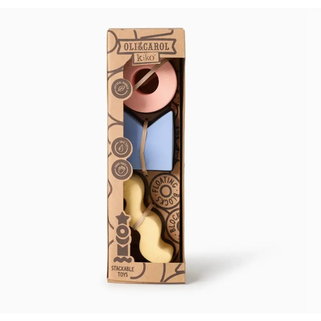 Chocolate toy set in a kraft box showcasing natural rubber floating stacking blocks