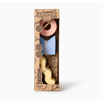 Chocolate toy set in a kraft box showcasing natural rubber floating stacking blocks