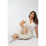 Relaxed high rise white linen pants with elastic waist in ecru