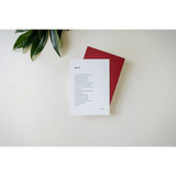White paper with text on a red card showcasing Wall Art Prints featuring Kate Baer’s Poetry, free shipping