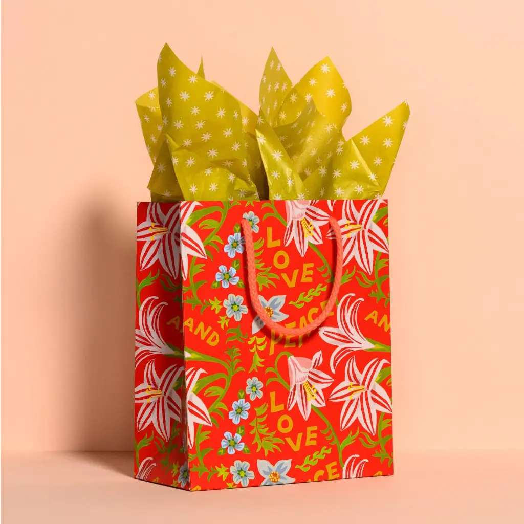 Red gift bag with floral and love text design, perfect for stylish womens clothes or gifts