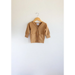 Tan buttery soft baby grandpa cardigan with pockets for the holiday season