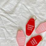 Retro motel key tags in pink and red for the Badass Babes Club hotel keychains