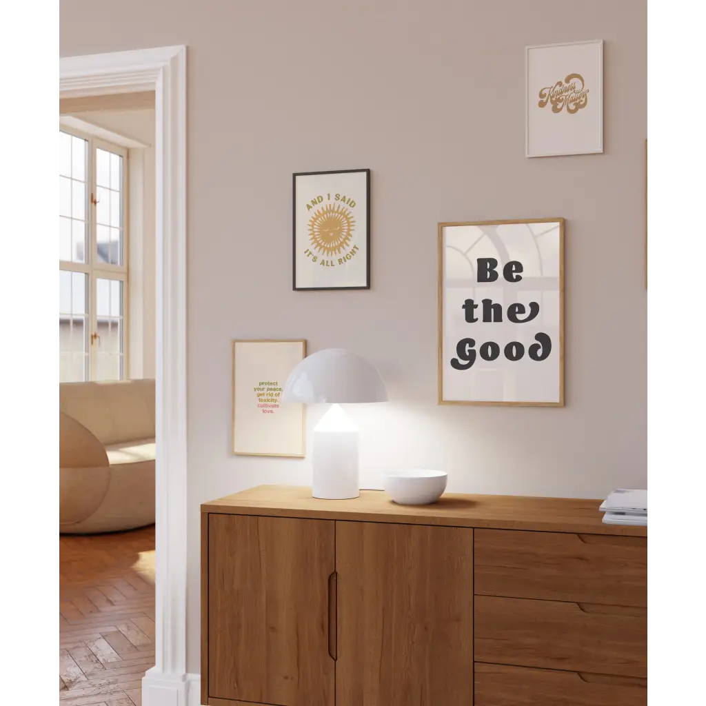 Wooden credenza with a white lamp and Good Vibes 8x10 wall print for decor