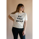White Be the Good Adult Unisex Crew Neck T-shirt with black text design