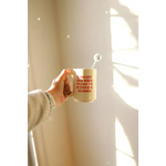 Beige 15oz extra large mug with red text from Behind Every Woman collection