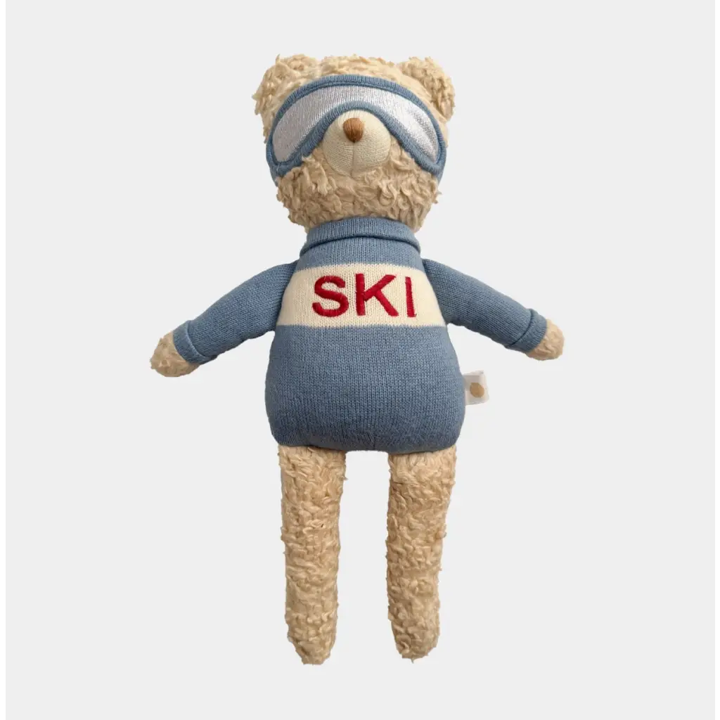 Benjamin Bear Ski plushie in ski goggles and a blue sweater ready for snow adventures