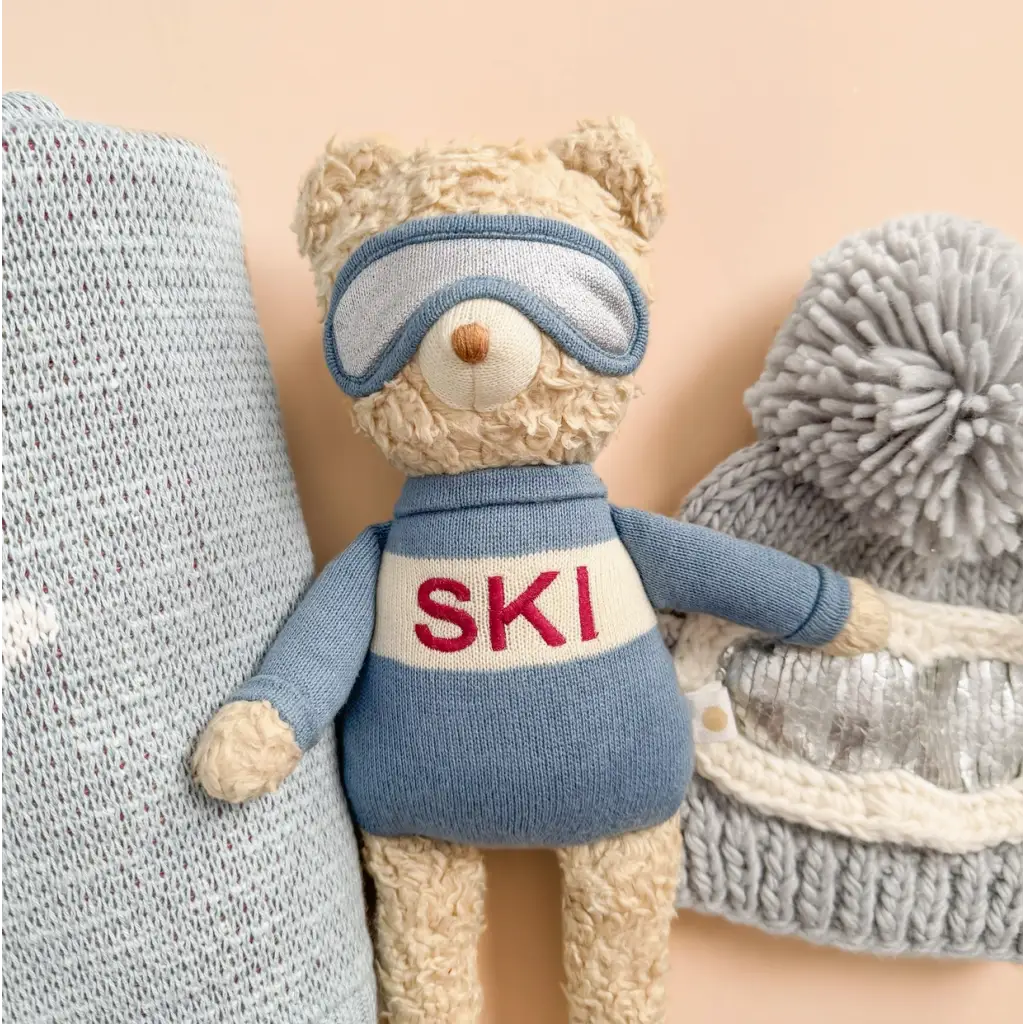 Plush Benjamin Bear ski plushie ready for snow adventures in a cozy blue sweater