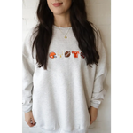 Light gray Big Fan Football embroidered sweatshirt with football-themed graphics