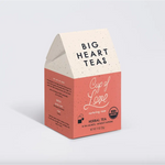 Box of Big Heart Teas with stylish womens clothes and polished prints on packaging