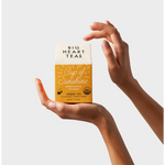 Big Heart Tea Co. Cup of Sunshine herbal tea box showcasing stylish womens clothes and polished prints