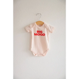 Light pink baby onesie with red BIG MOOD print made from organic cotton