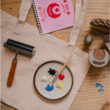 Crafting supplies for block printing on a Blok Parti Cosmic Print Tote Bag