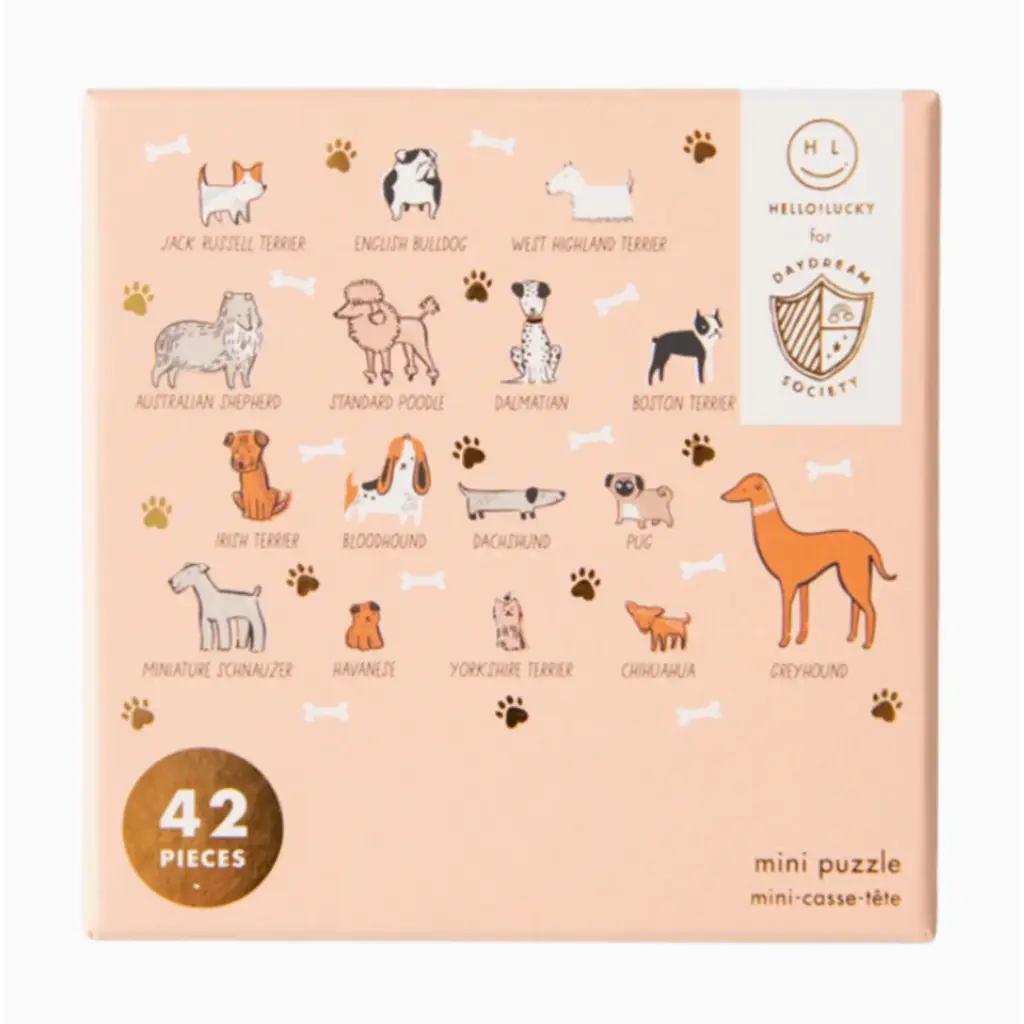 42-piece Bow Wow Breeds mini puzzle featuring cute dog breed illustrations on a pink box