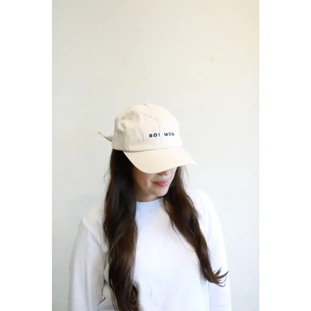 White baseball cap with BOI text, perfect for a boy mom style