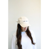 White baseball cap with BOI text, perfect for a boy mom style