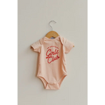 Pink baby onesie with red Girls Club text for Brave Girls Club cuties