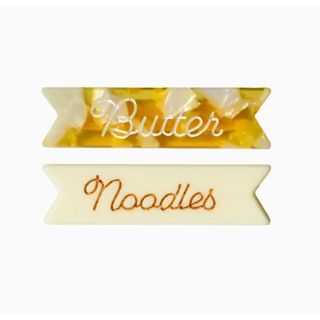 Cute butter noodles hair clips featuring cursive labels for a fun style