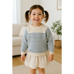 Toddler wearing Charlie striped sweater made of soft cotton with polished prints