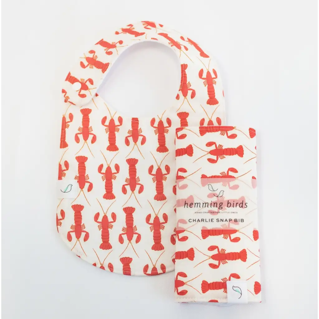Navy Charlie Snap Bib with Coral Lobster Prints for stylish baby mealtime fun