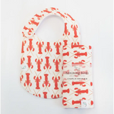 Navy Charlie Snap Bib with Coral Lobster Prints for stylish baby mealtime fun