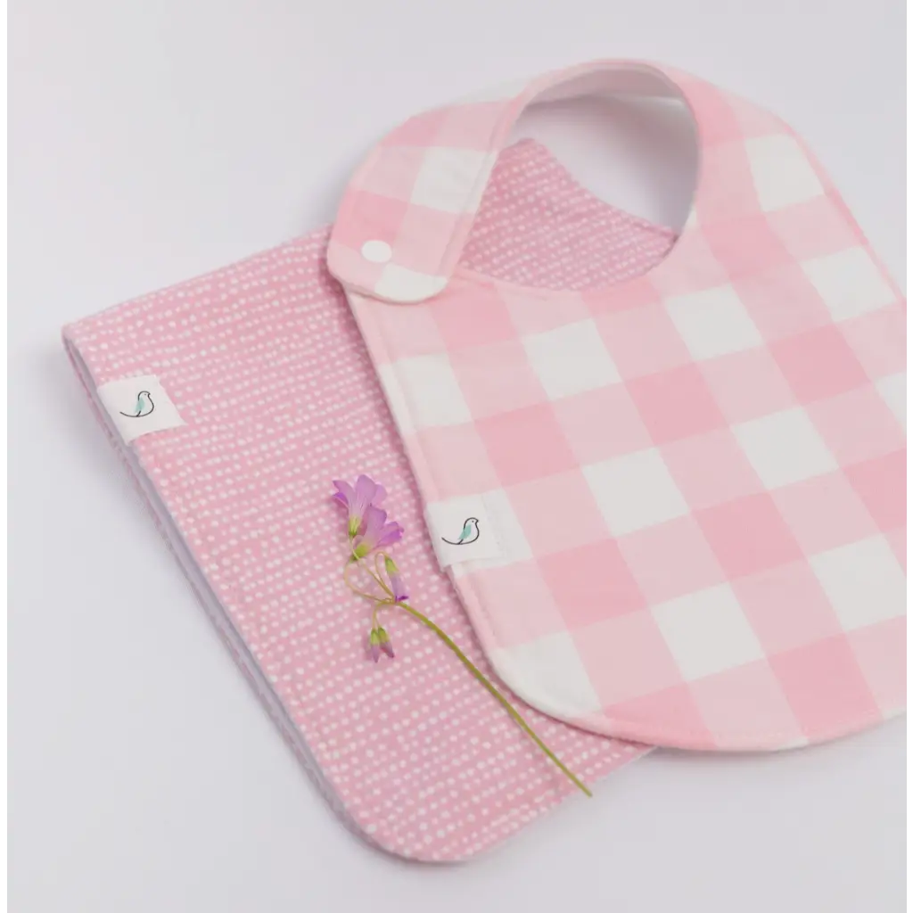Pink and white checkered Charlie Snap Bibs with matching burp cloth featuring cute ducks