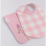 Pink and white checkered Charlie Snap Bibs with matching burp cloth featuring cute ducks