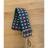 Patterned fabric adjustable purse straps with checkered blue, red, and white design