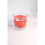 Clear glass cocktail glass featuring red geometric pattern, perfect for any drink