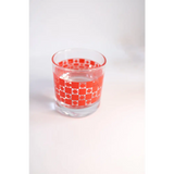 Clear glass cocktail glass featuring red geometric pattern, perfect for any drink