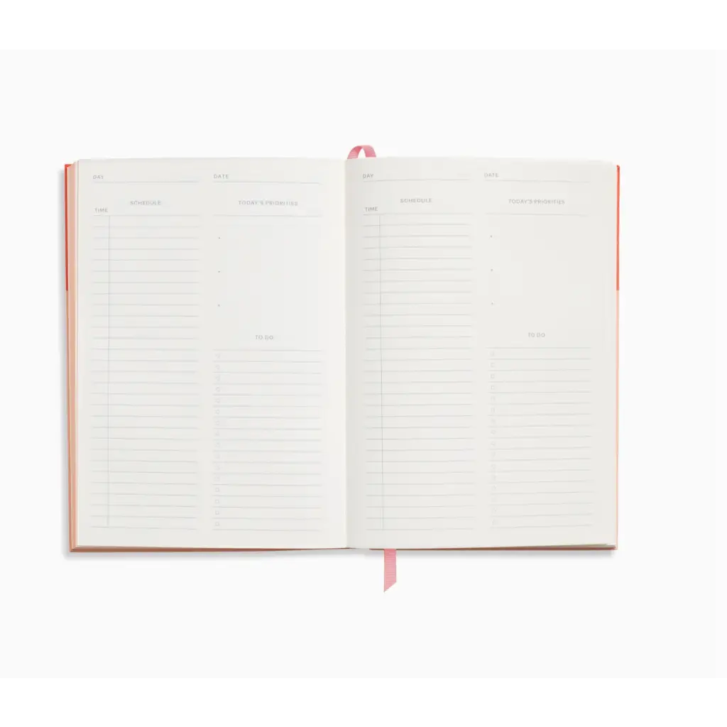 Open pink journal with lined pages from Colorblock A5 Softcover Undated Page A Day Planner, perfect for stylish womens clothes and polished prints