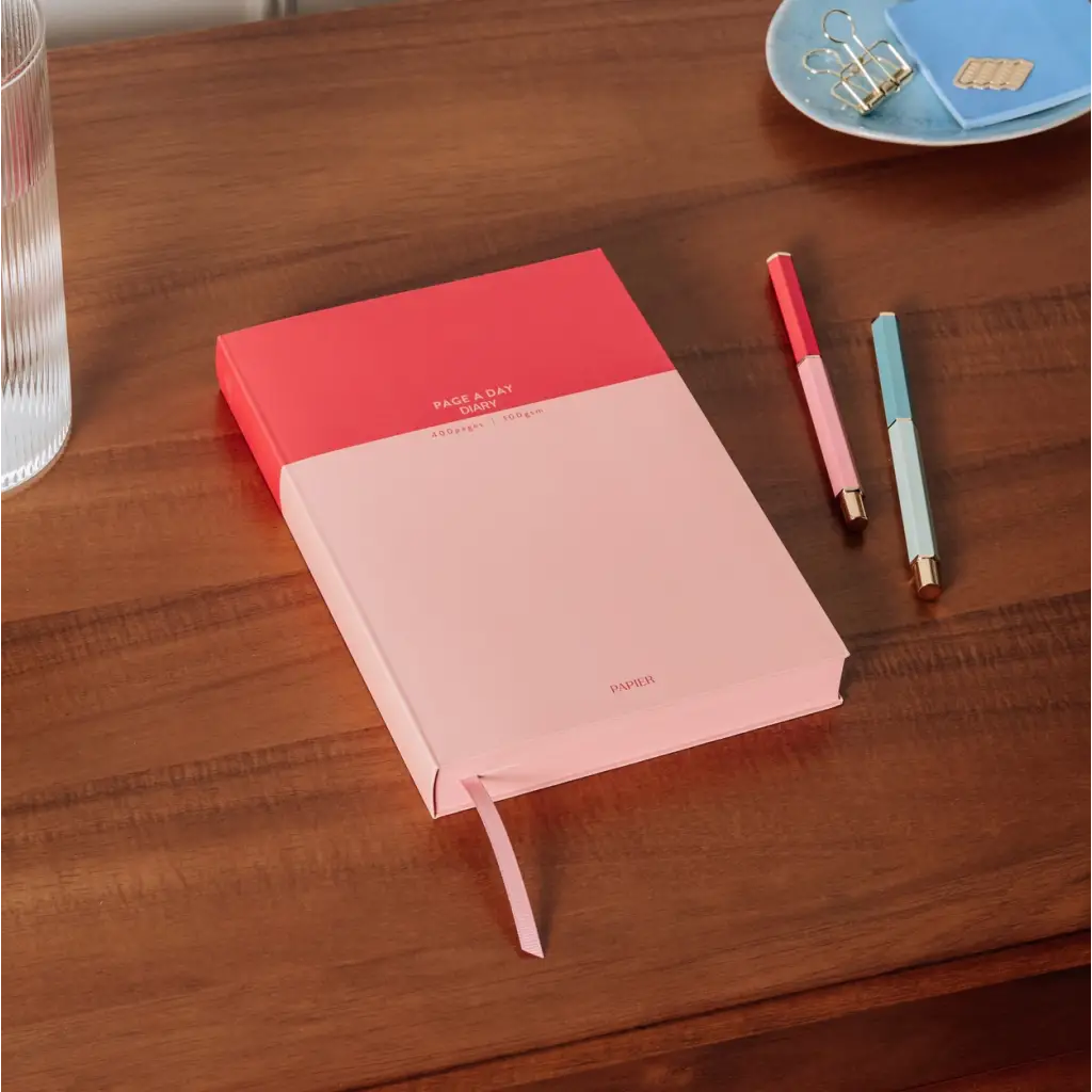 Two-toned pink diary with matching pens from Colorblock A5 Softcover Undated Planner