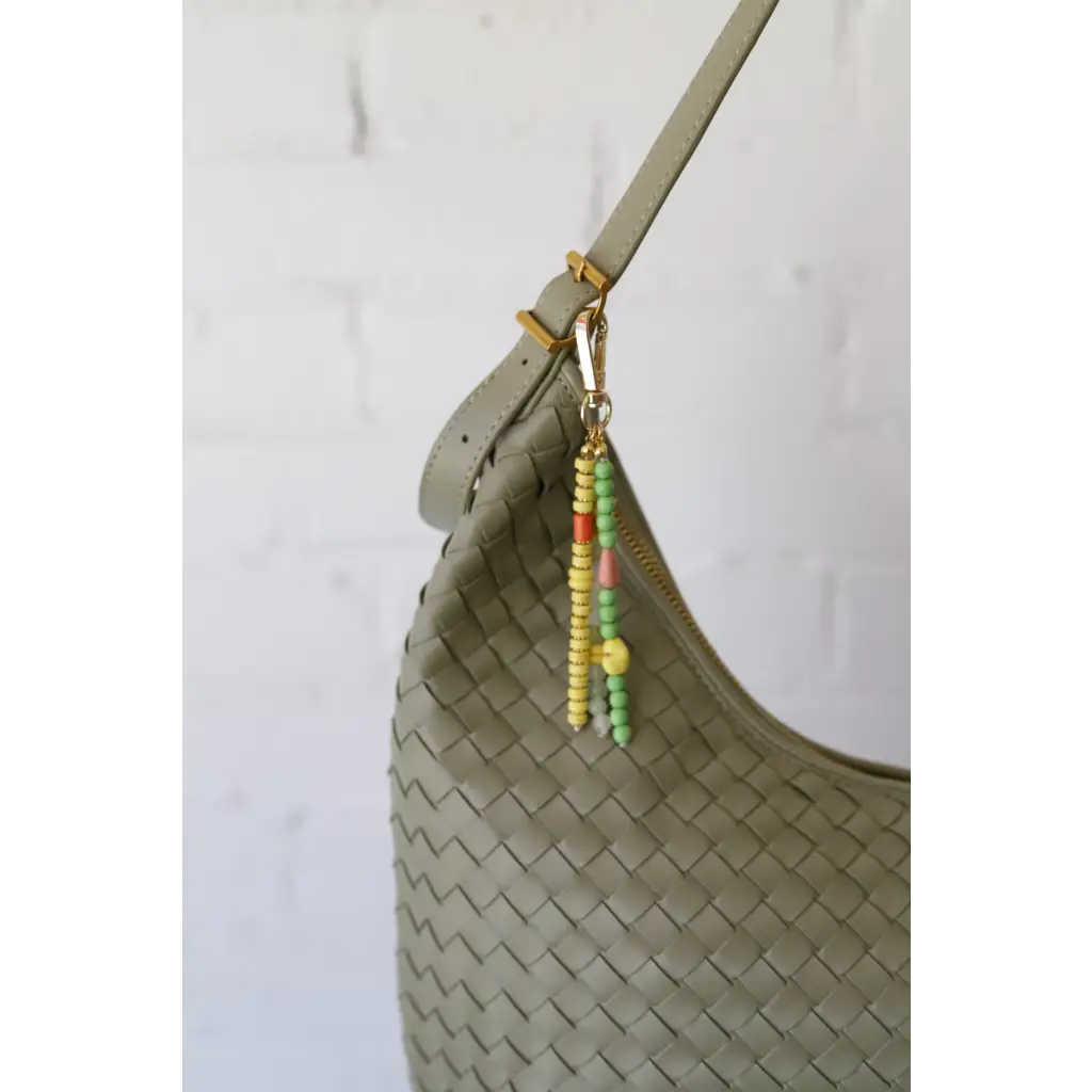 Sage green Diana Woven Bag XL with vegan leather, colorful beaded charm, two interior pockets
