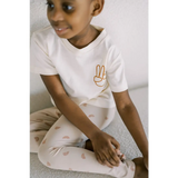 White t-shirt with peace sign, perfect with Ditsy Rainbow Leggings for kids