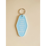 Light blue motel keychain with funny text about kissing your mother for daily laughs