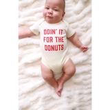 Playful Baby Onesie in organic cotton with red Doin It For The Donuts text