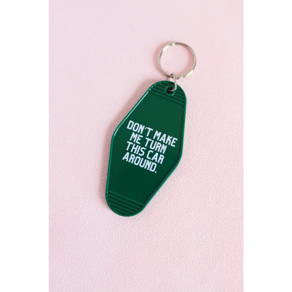 Green vintage hotel keychain with funny Don’t Make Me Turn This Car Around text