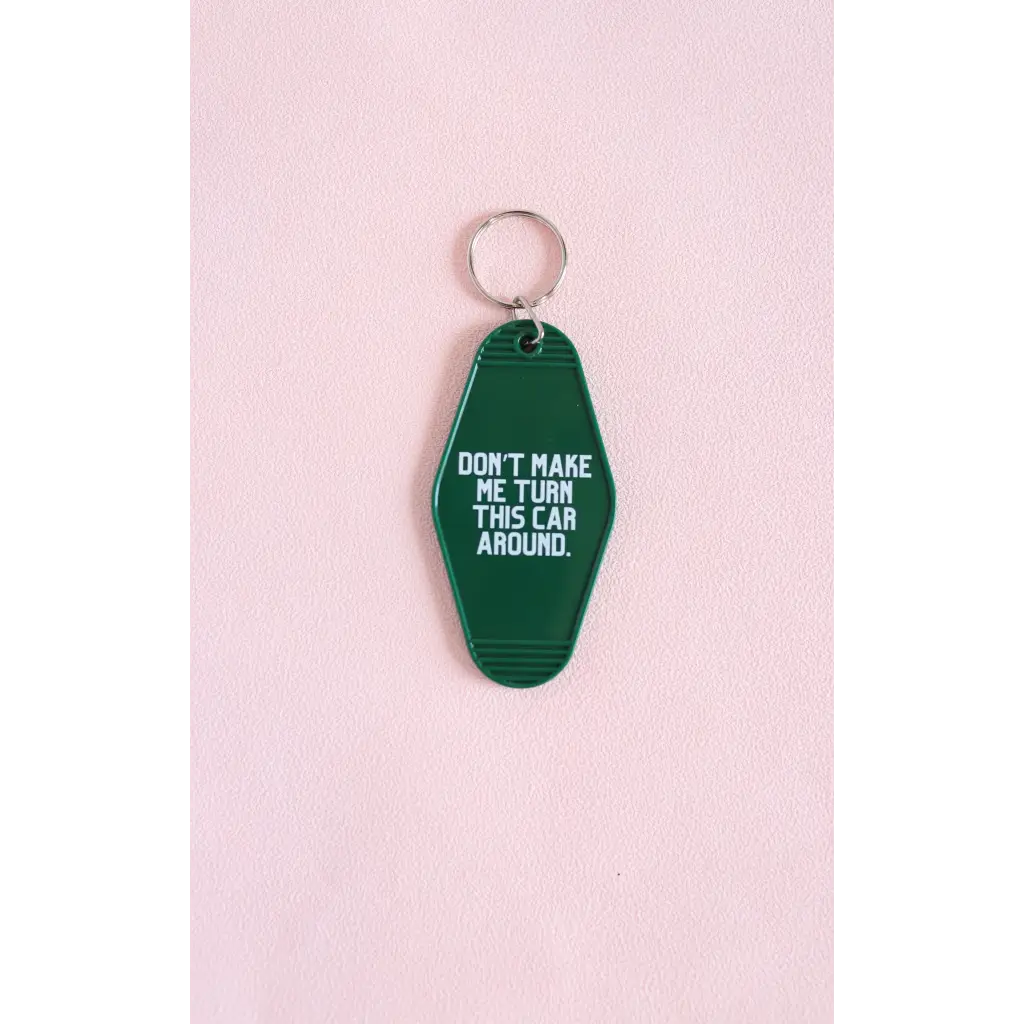 Green vintage hotel keychain with funny Don’t Make Me Turn This Car Around text