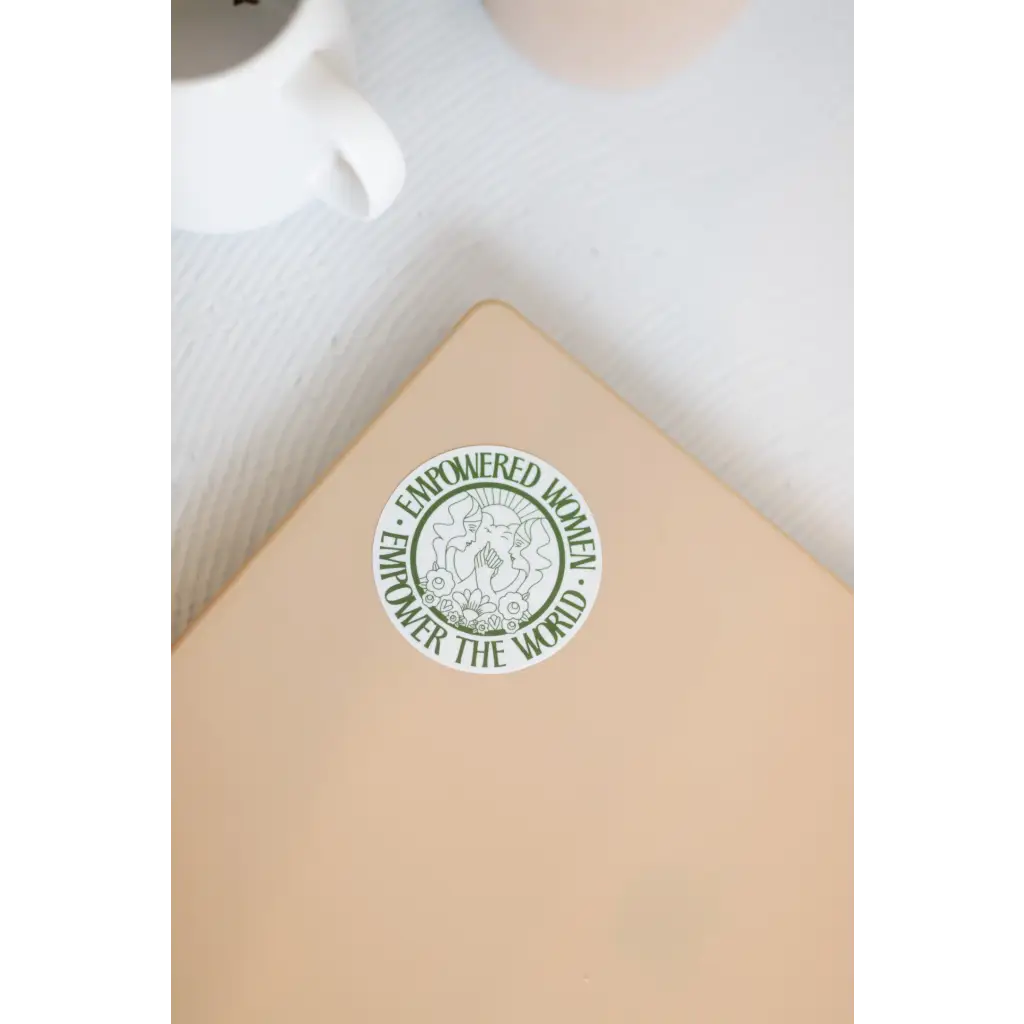Starbucks logo sticker on beige with Empowered Women sticker for positive vibes