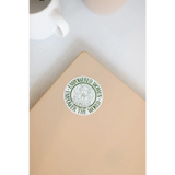 Starbucks logo sticker on beige with Empowered Women sticker for positive vibes