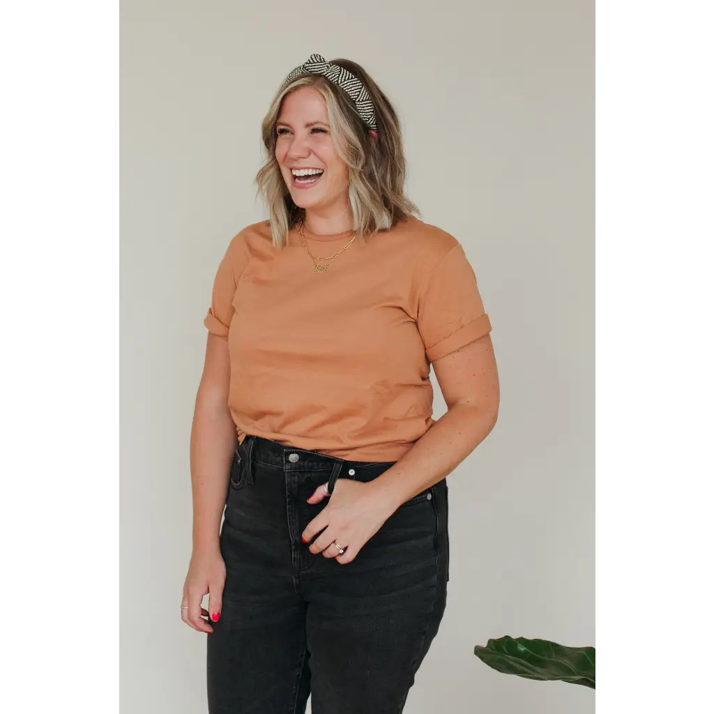 Casual orange crewneck sweater and black jeans with Toasted Unisex Adult Tee in Organic Cotton