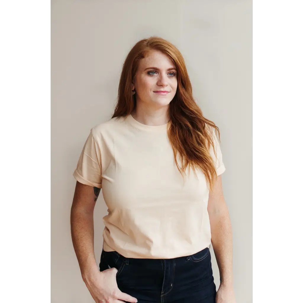 Woman in cream Sunkiss Unisex Adult Tee made from soft organic cotton
