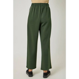 Olive green satin tracksuit pants with elastic waist and black slip-on shoes for stylish womens clothes
