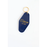 Navy blue vintage motel key tag with gold lettering for your Getaway Car vibe