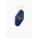Navy blue vintage motel key tag with gold lettering for your Getaway Car vibe
