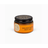 Jar of Golden Glow Beauty Balm for radiant skin, perfect with polished prints and stylish Womens clothes