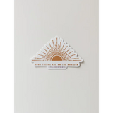 Decorative sticker with a rising sun and good things are on the horizon text